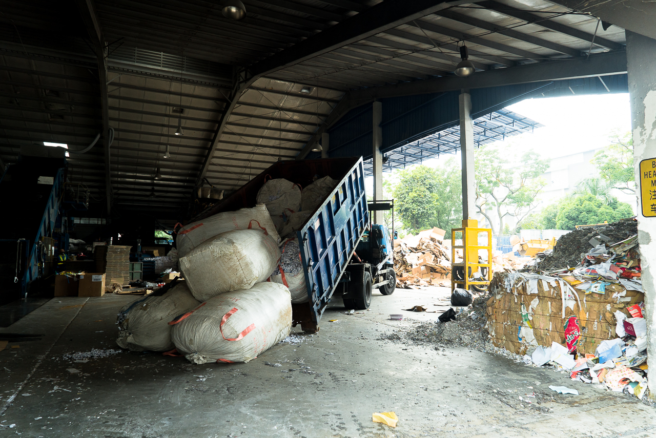 Rice-Media-Trash-Treasure-Life-Paper-12 Paper being unloaded